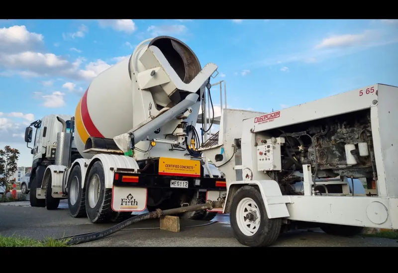 Concrete pumping team working on site