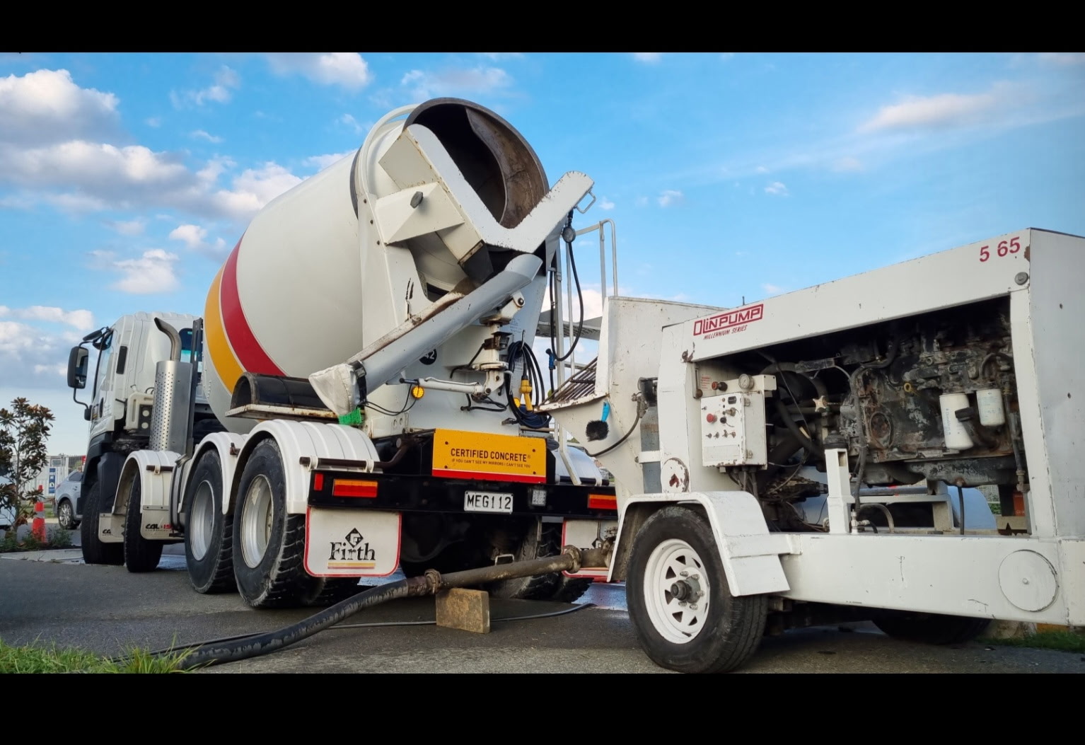 Concrete pumping team working on site